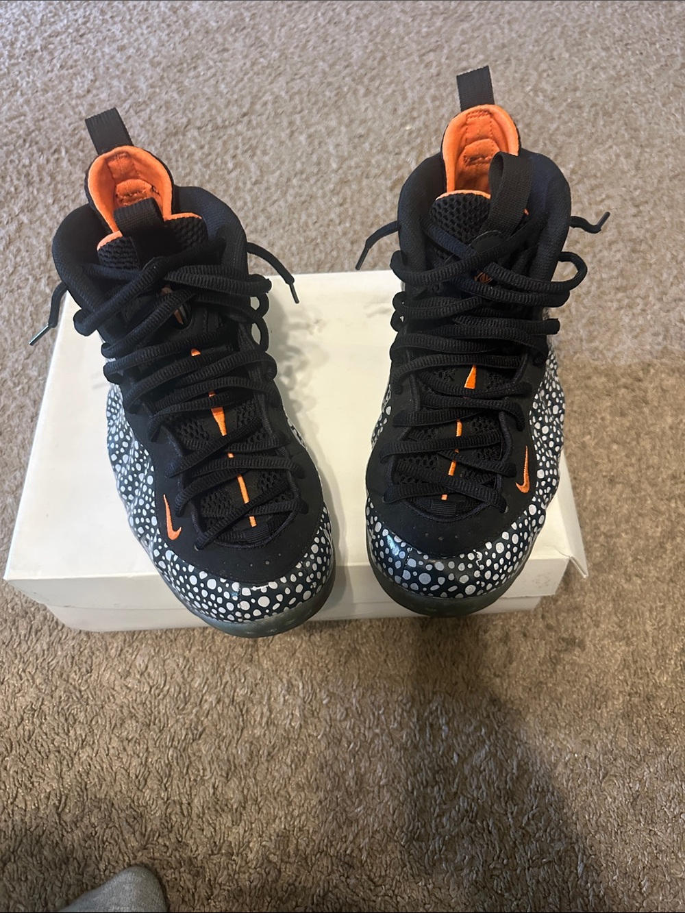 Nike Black Sneakers with Orange Interior and White Speckle Accents